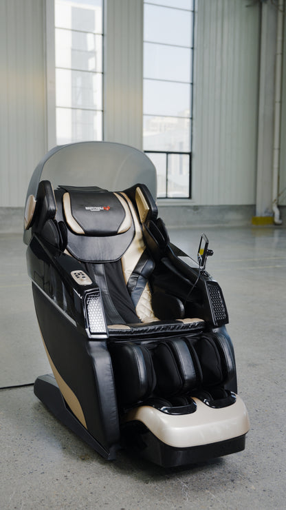 The BefitNow Canada 4D SL Luxury Voice Control Custom Massage Chair, featuring a built-in touchscreen panel, stands in a spacious industrial-style room with large windows and concrete floors.