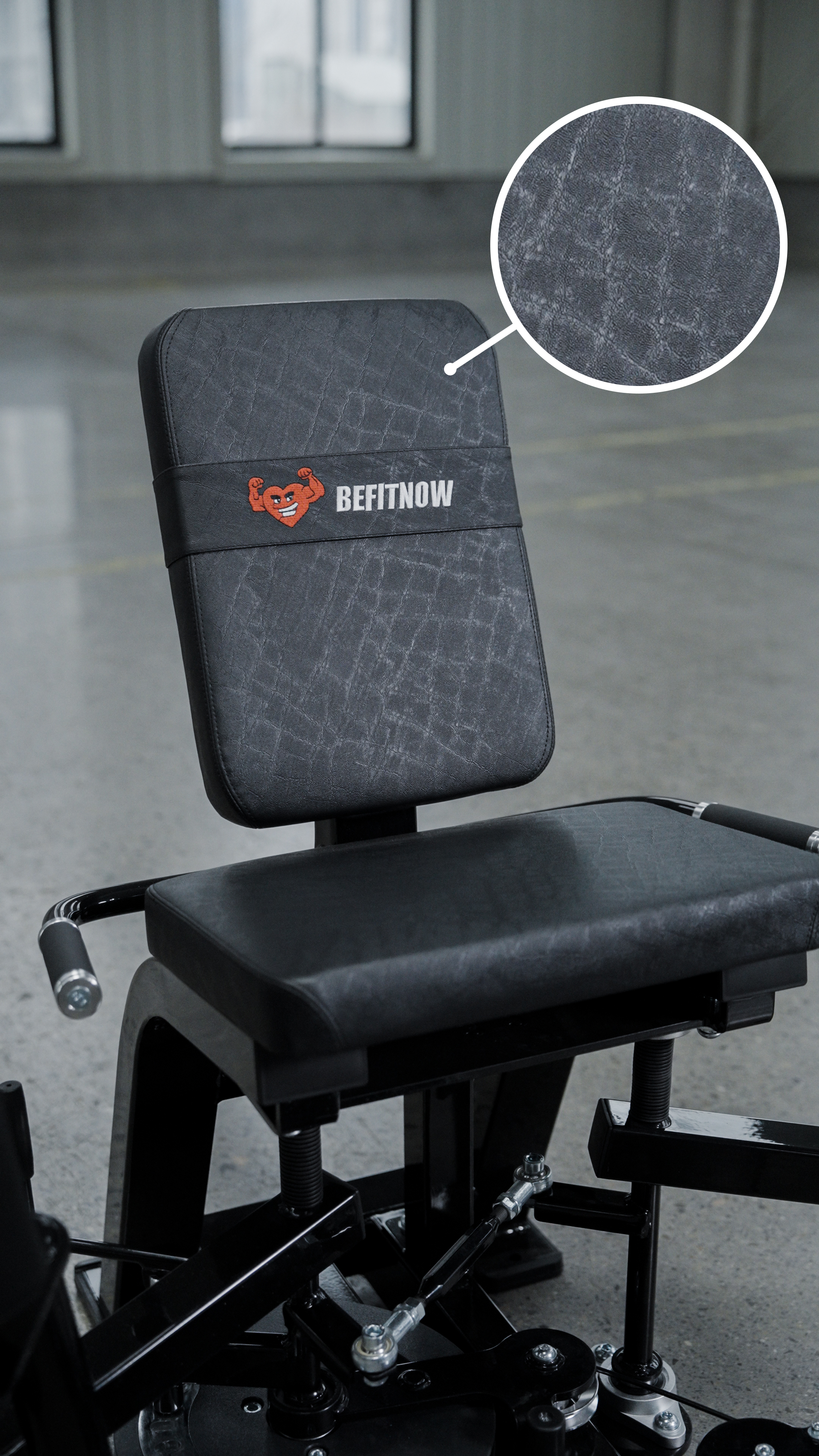 A close-up of the HS32 Abductor/Adductor gym machine by BefitNow Canada shows its textured black seat and backrest with the white and orange BEFITNOW logo, plus an inset highlighting the detailed texture—ideal for any home gym.