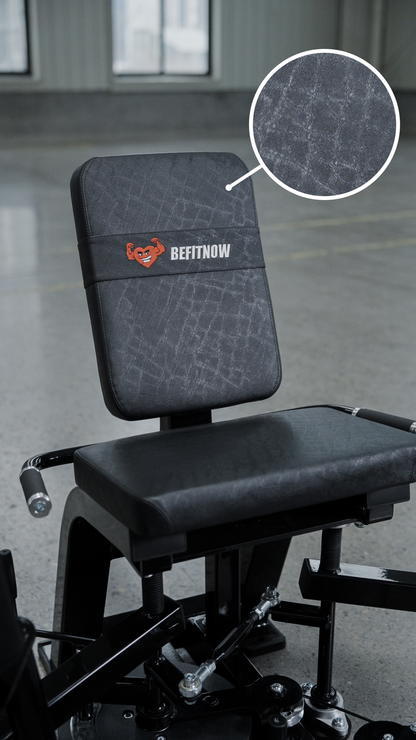 A close-up of the HS32 Abductor/Adductor gym machine by BefitNow Canada shows its textured black seat and backrest with the white and orange BEFITNOW logo, plus an inset highlighting the detailed texture—ideal for any home gym.