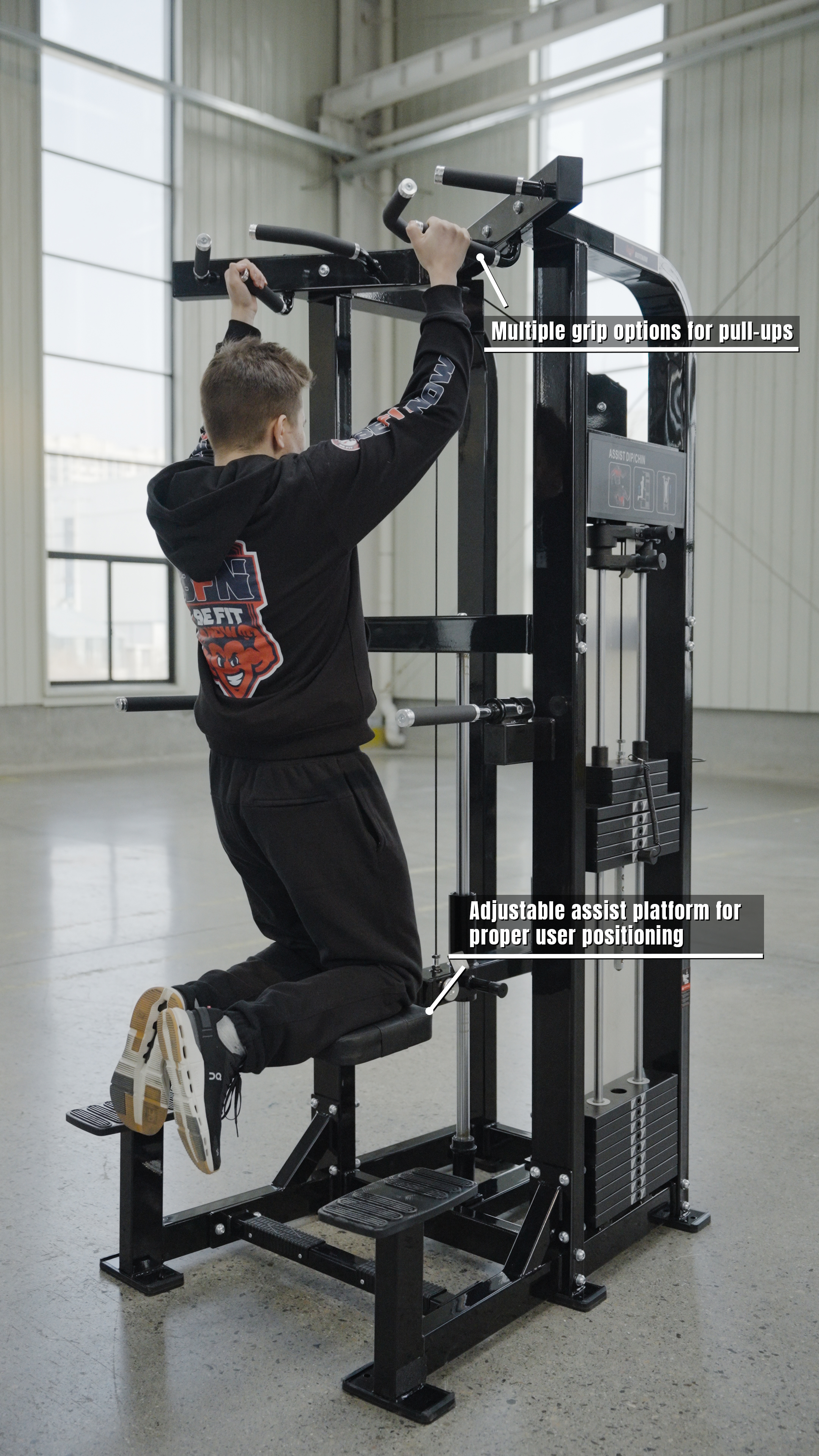 A person uses the BefitNow Canada Dip/Chin Assist, gripping an overhead bar. The text highlights various grip options and an adjustable assist platform to build upper-body strength—ideal for spacious, bright commercial gym settings.