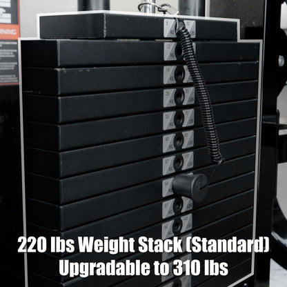 Close-up of the weight stack on the BefitNow Canada Leg Extension/Lying Down Leg Curl machine, featuring an adjustable pin and a label: “220 lbs Weight Stack (Standard), Upgradable to 310 lbs.”.