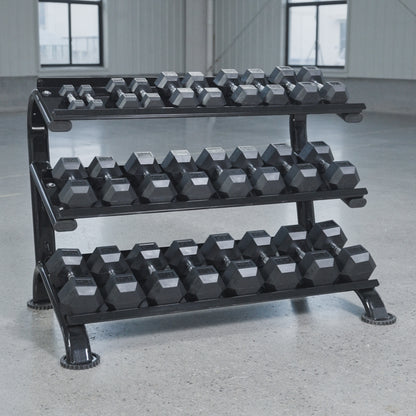 The BefitNow Canada 3 Tier Commercial Hex Dumbbell Rack displays black hex dumbbells on a smooth concrete floor in a spacious, well-lit gym with large windows.