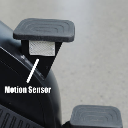 Close-up of The SkyStep Stair Climber pedal by BefitNow Canada, featuring a motion sensor marked by a white label and arrow. Set against a gray speckled floor—ideal for effective cardiovascular training.