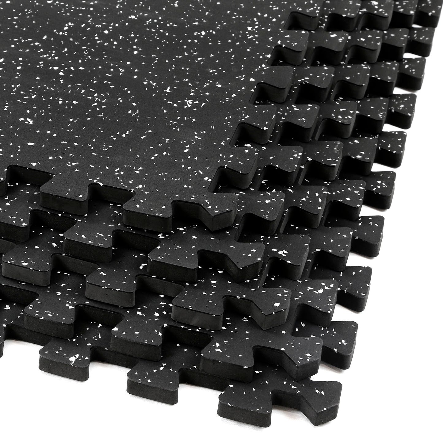 A row of interlocking BefitNow Canada 20mm Commercial Rubber Floor Mats features black foam with white speckles. Each mat has puzzle-like edges for easy connection, making them ideal for gym flooring or play areas. Crafted from recycled rubber, these mats offer a seamless, eco-friendly surface.