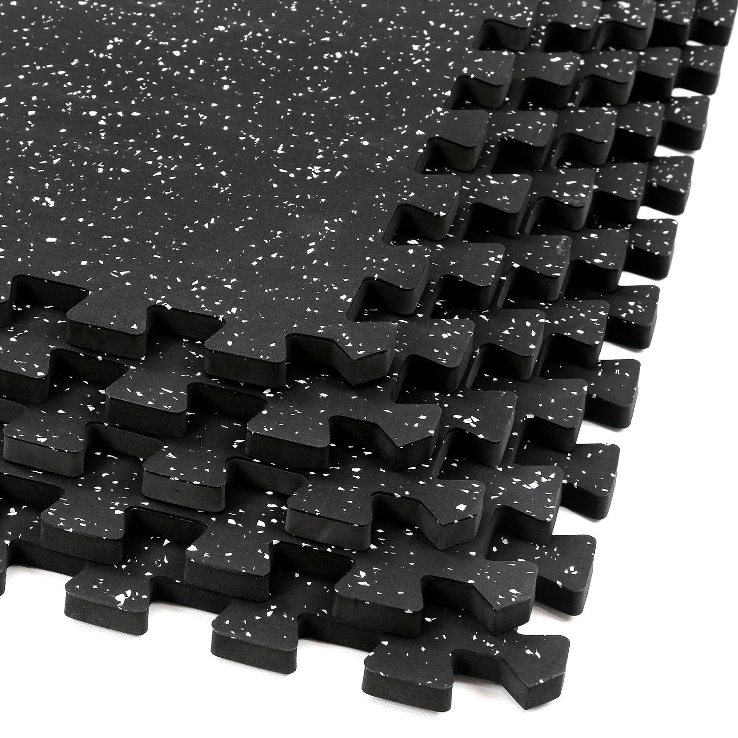 A row of interlocking BefitNow Canada 20mm Commercial Rubber Floor Mats features black foam with white speckles. Each mat has puzzle-like edges for easy connection, making them ideal for gym flooring or play areas. Crafted from recycled rubber, these mats offer a seamless, eco-friendly surface.