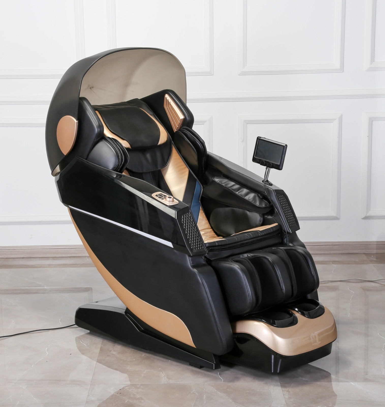 A BefitNow Canada 4D SL Luxury Voice Control Custom Massage Chair, with a sleek black and gold design, sits in a room with light tiles and white-paneled walls. It has a built-in tablet and multiple cushioned sections for ultimate deep tissue massage comfort.